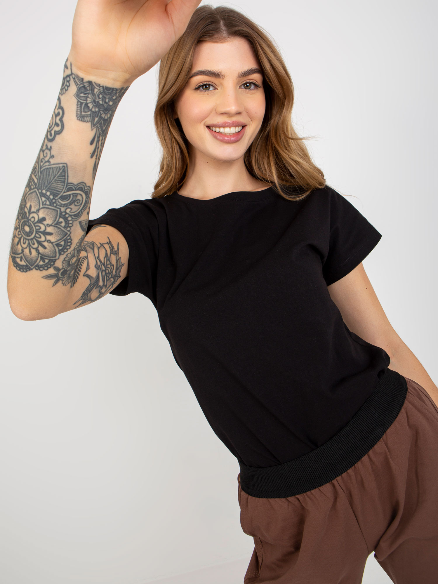 Simple black basic T-shirt with a round neckline