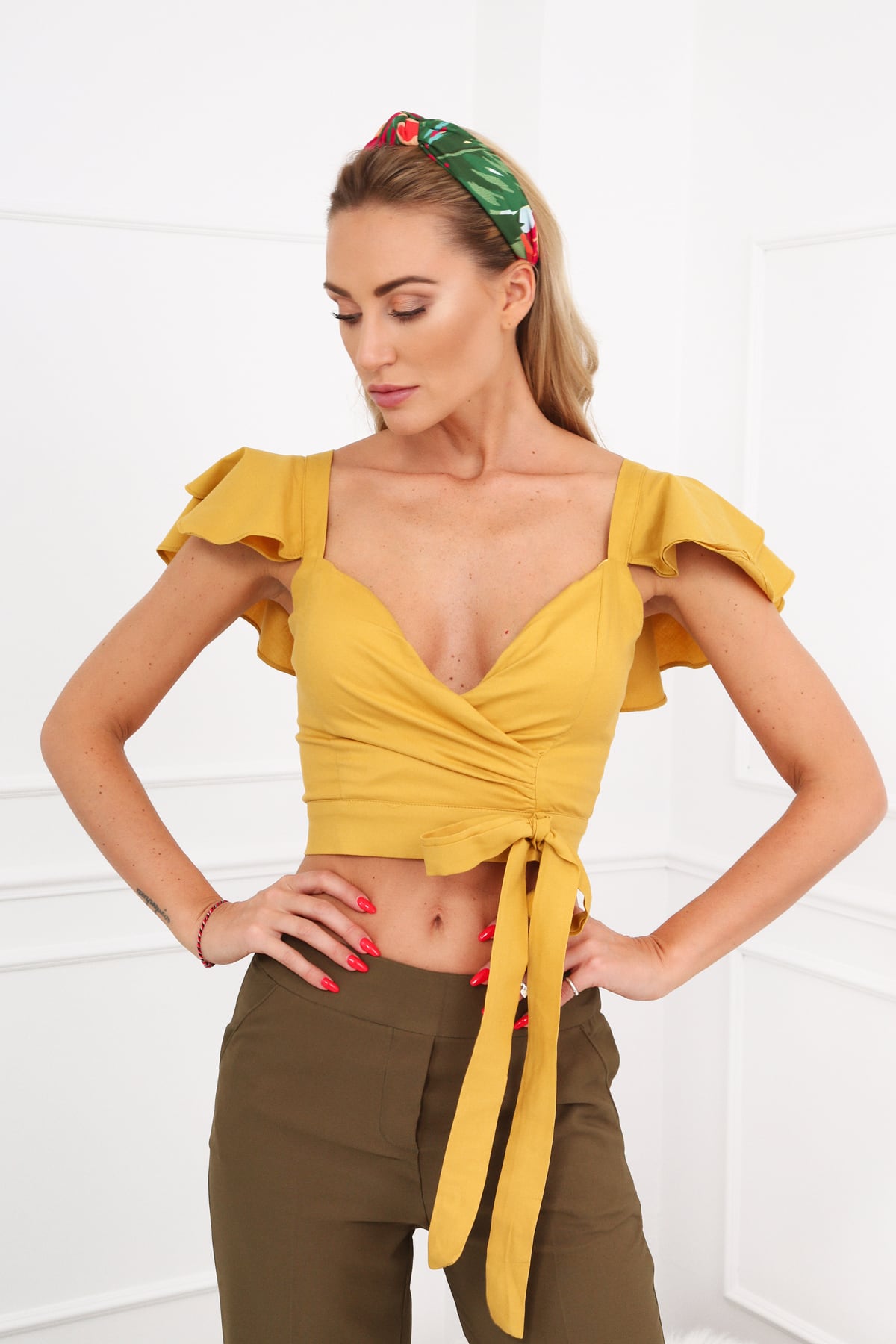 Mustard blouse with pleated shoulders