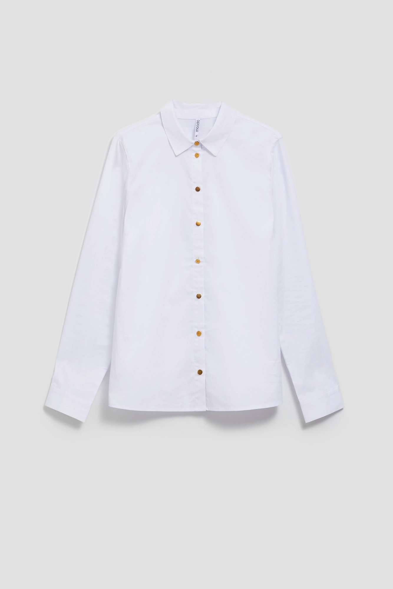 Plain shirt with decorative buttons