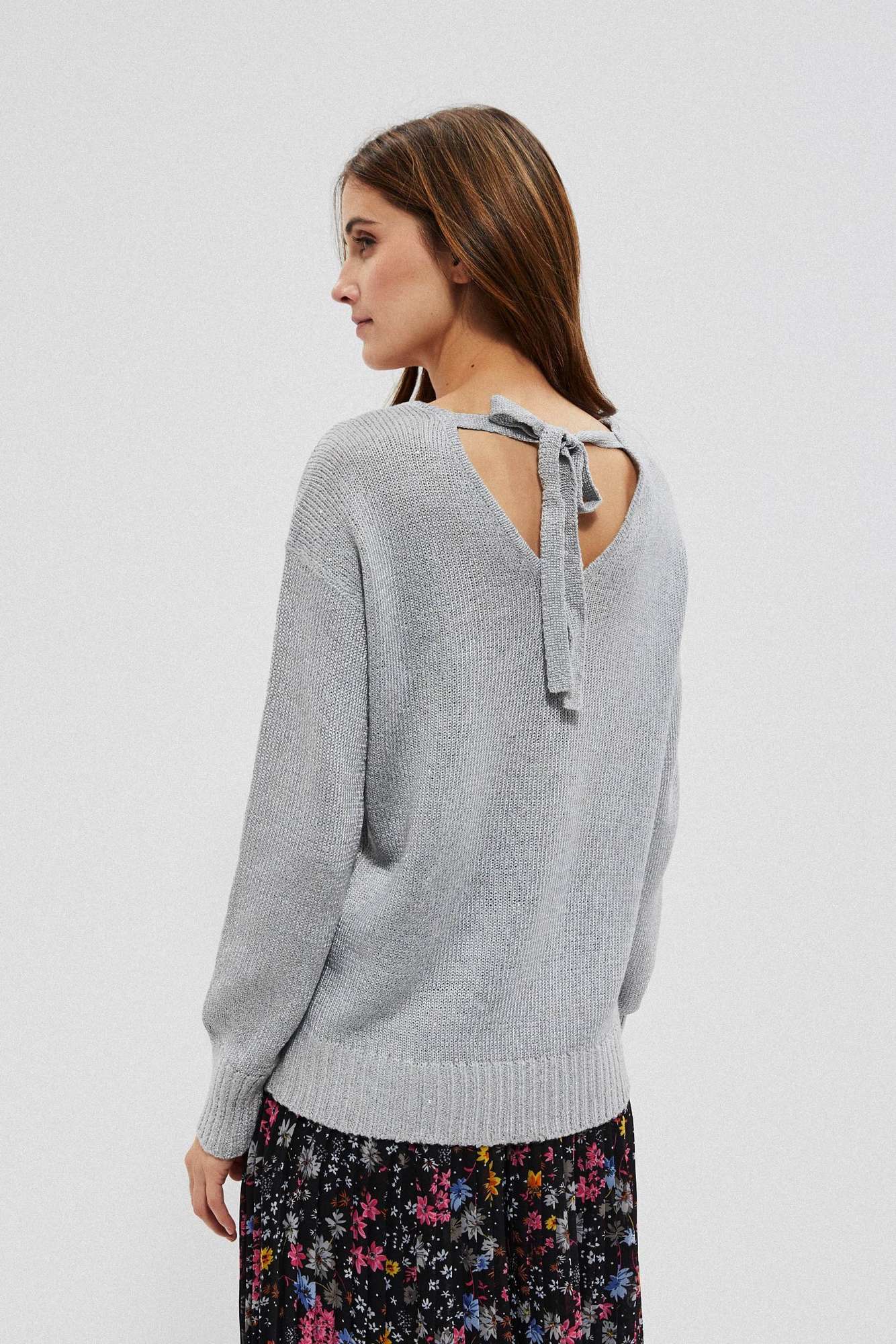 Sweater with a neckline on the back