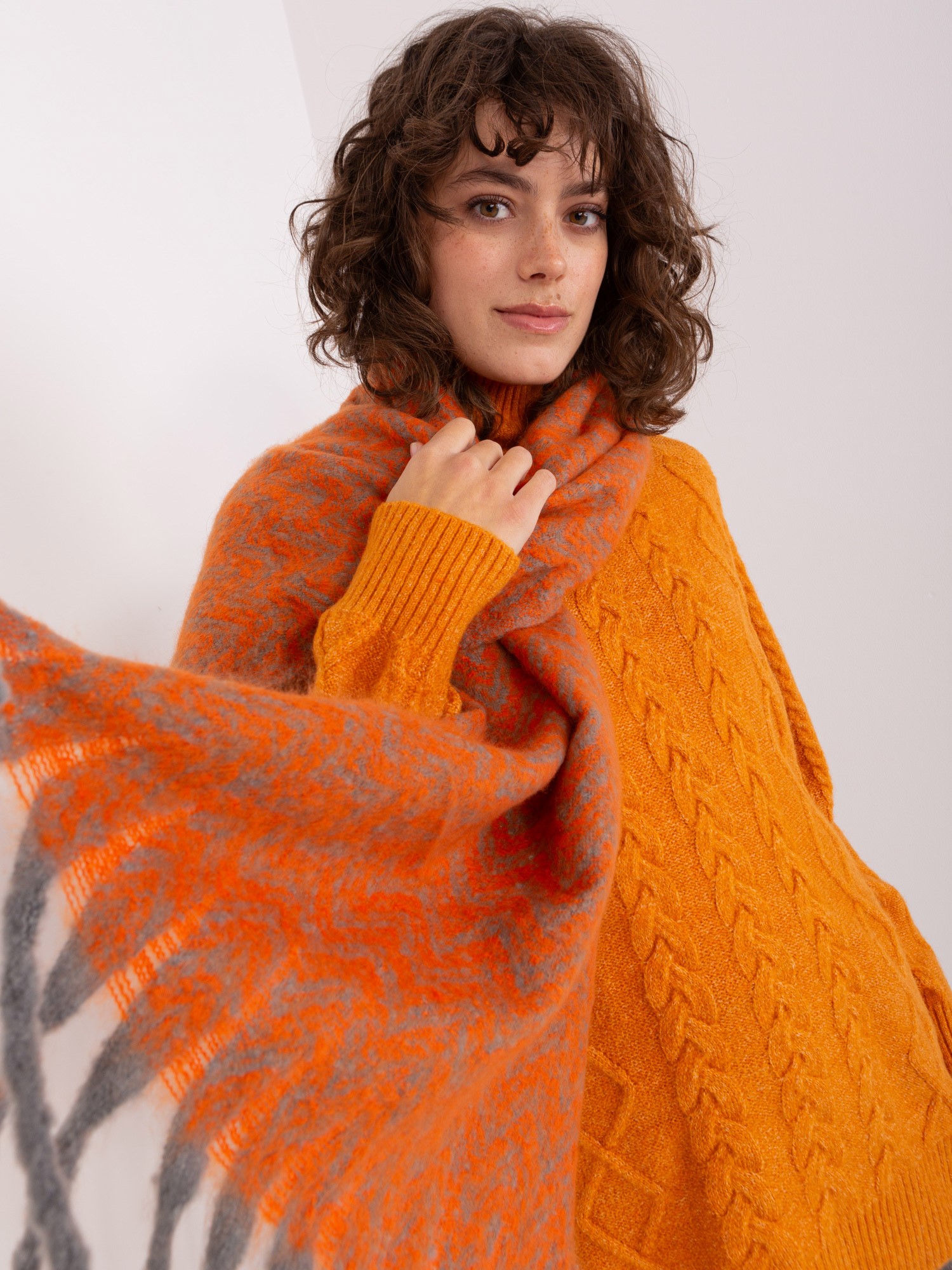 Grey and orange scarf with patterns