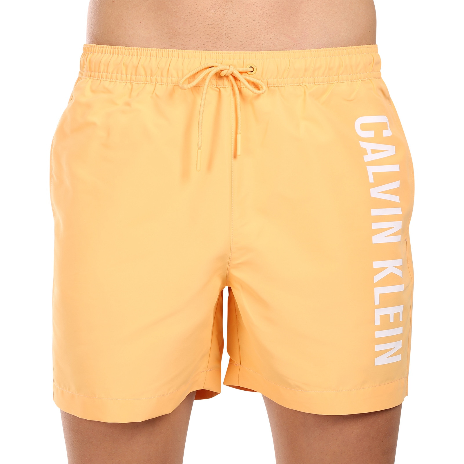 Levně Pánské plavky Calvin Klein oranžové