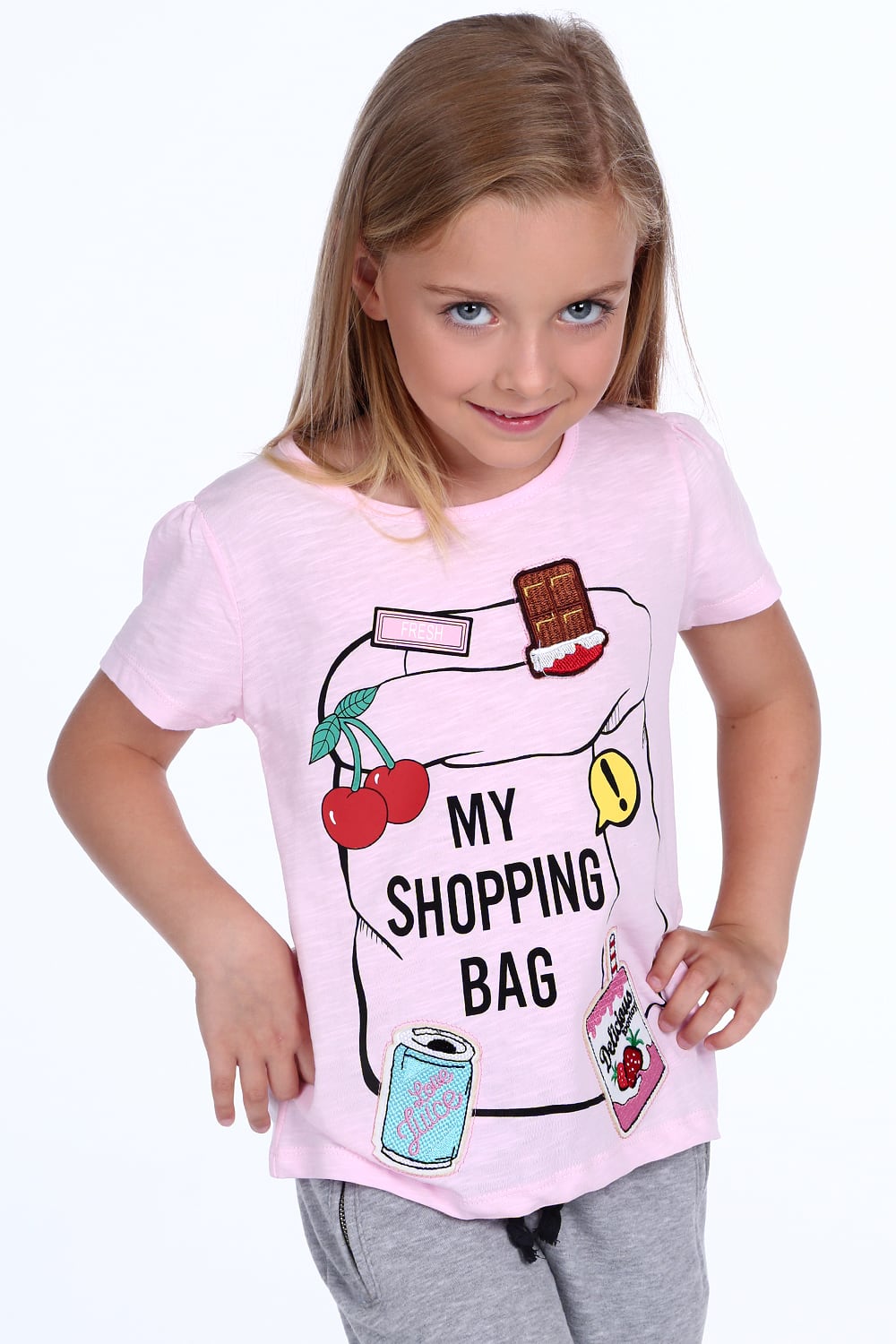 Levně Dívčí tričko s nášivkami ve světle růžové barvě