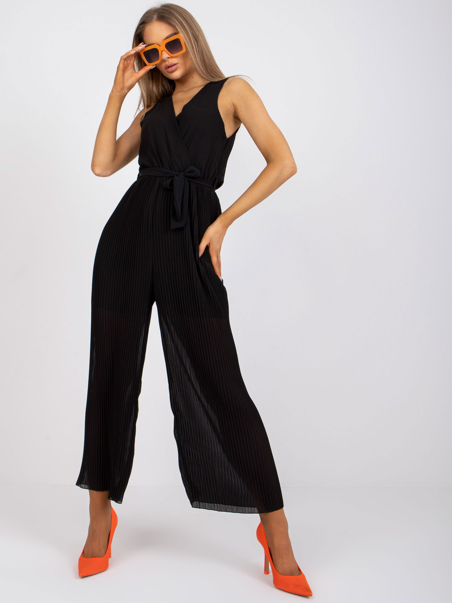 Black overall with wide pleated legs
