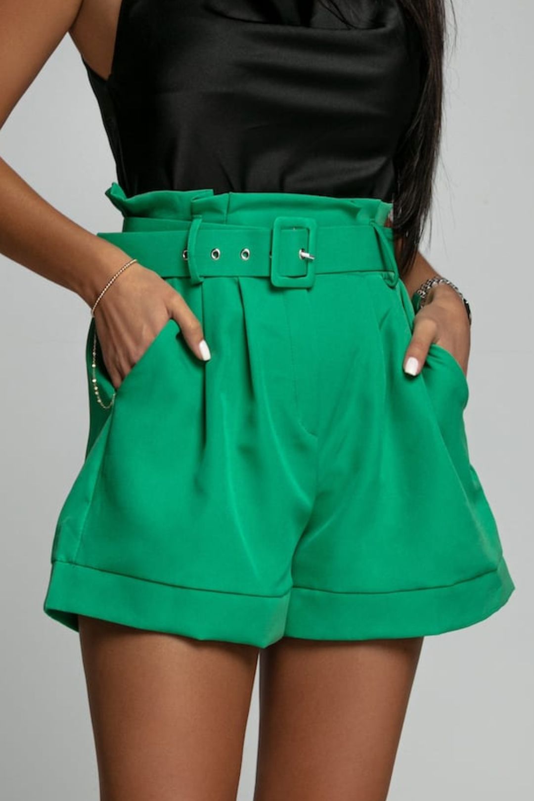 Women's shorts with high waist and green belt