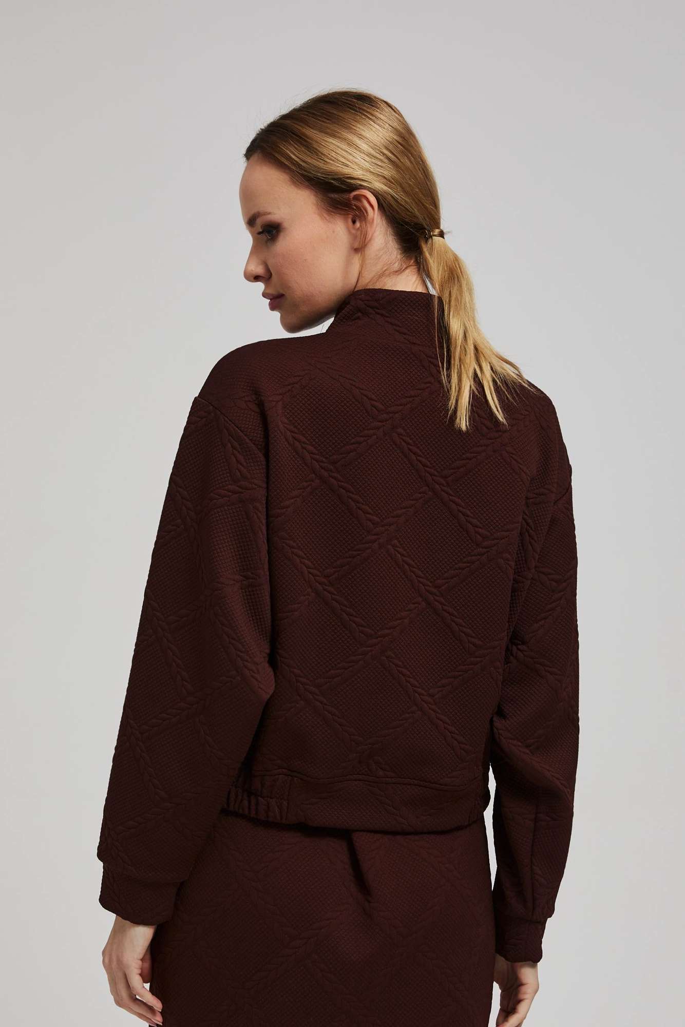 Sweatshirt with decorative buttons