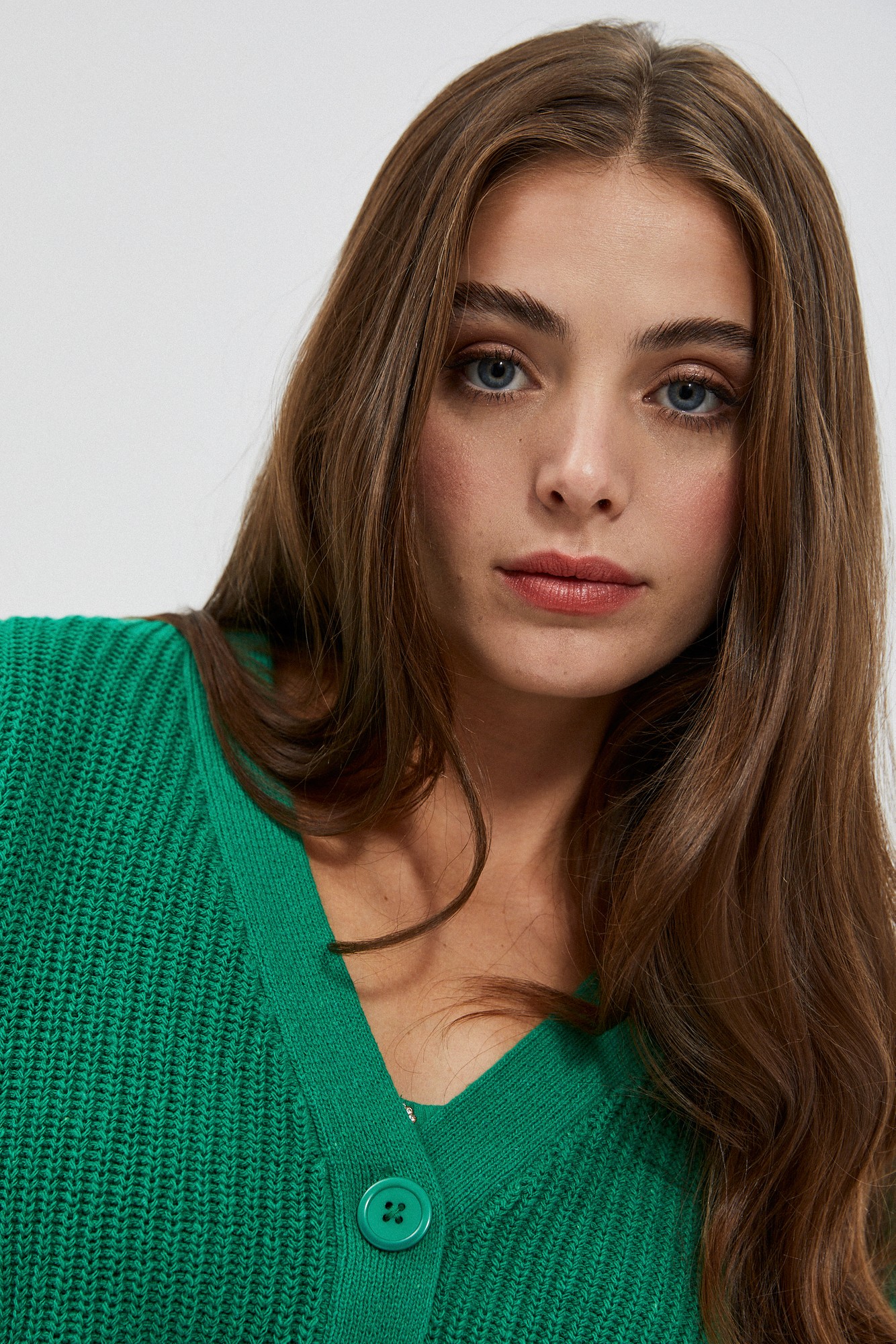 Short cardigan with button closure