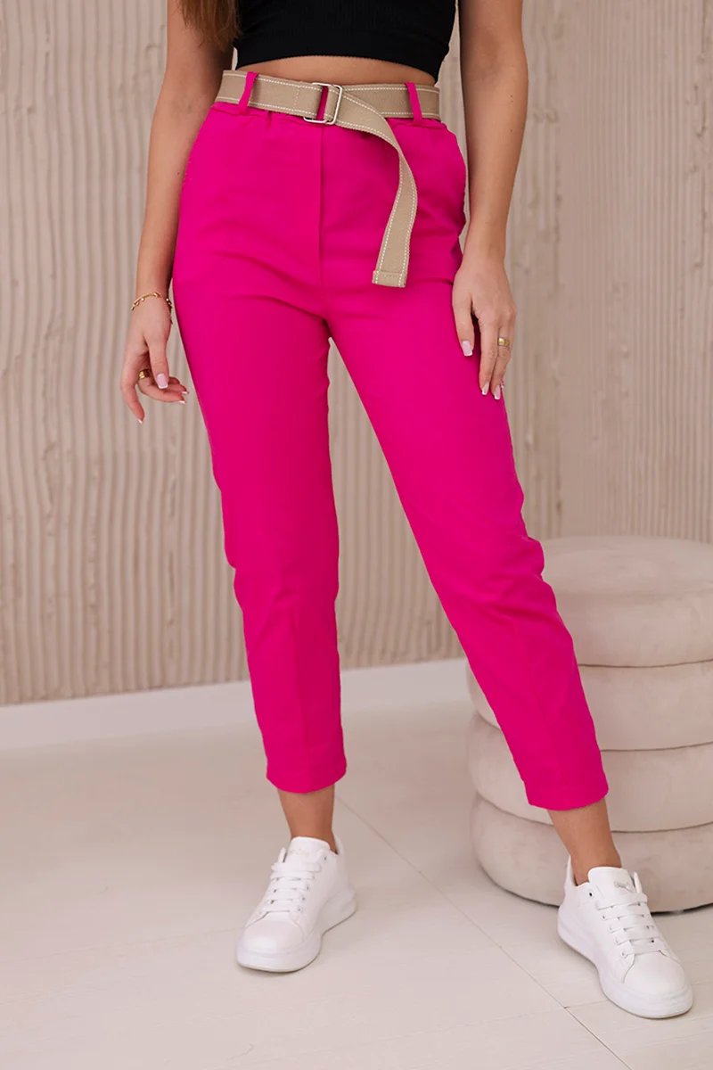 Fuchsia-coloured trousers with wide belt