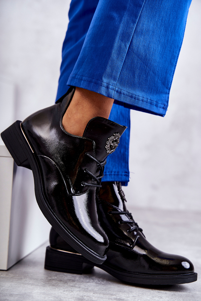 Lacquered lace-up boots with cut-outs in Black Fabiana