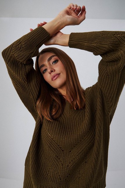 Sweater with openwork pattern
