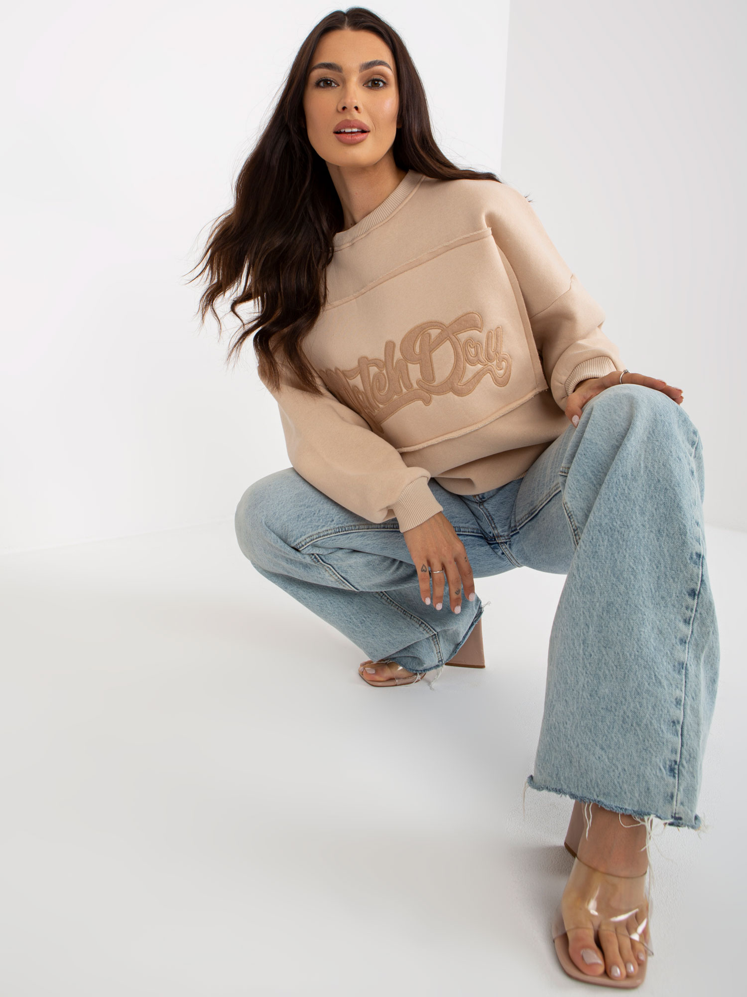 Light beige sweatshirt with patches