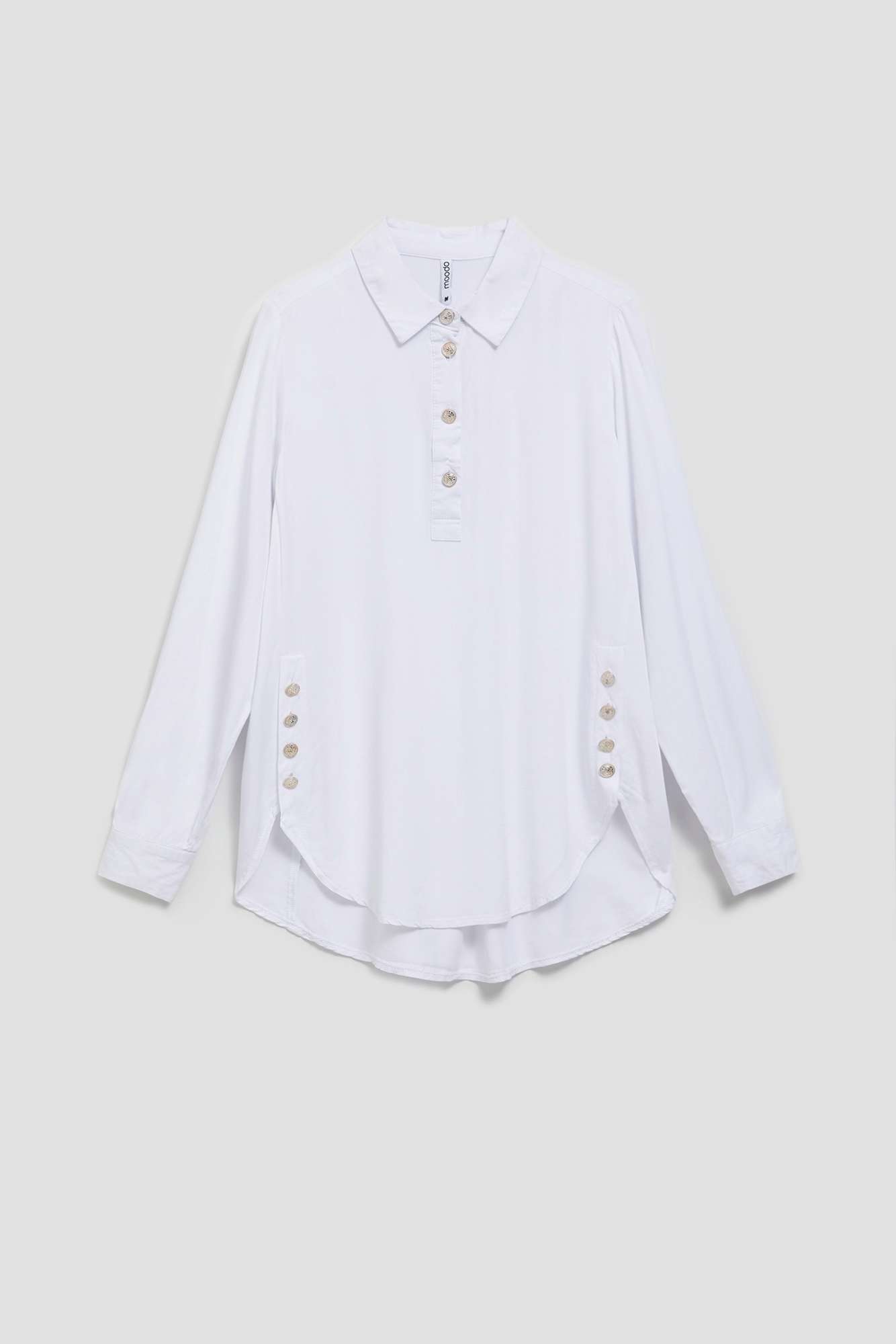 Shirt with decorative buttons