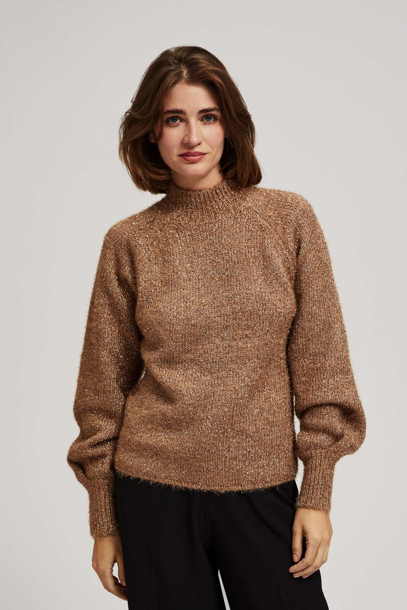 Turtleneck sweater decorated with metallic thread