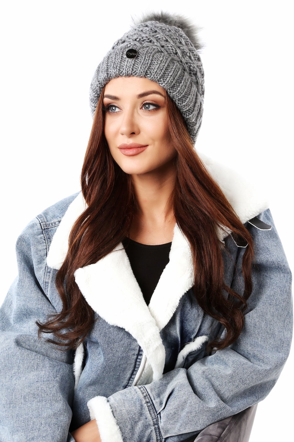 Warm, dark gray winter cap with pompom