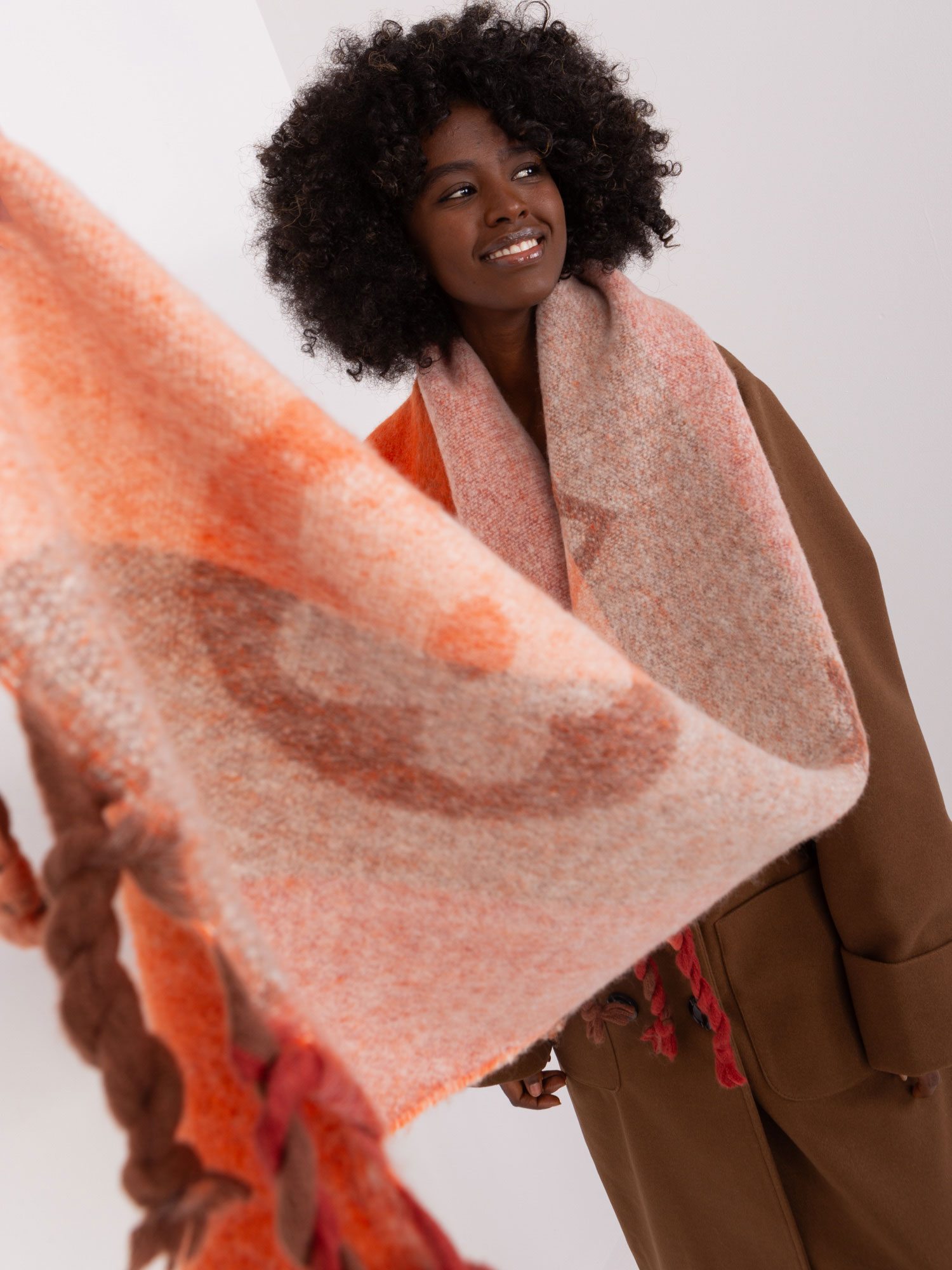 Dark orange winter scarf with fringe