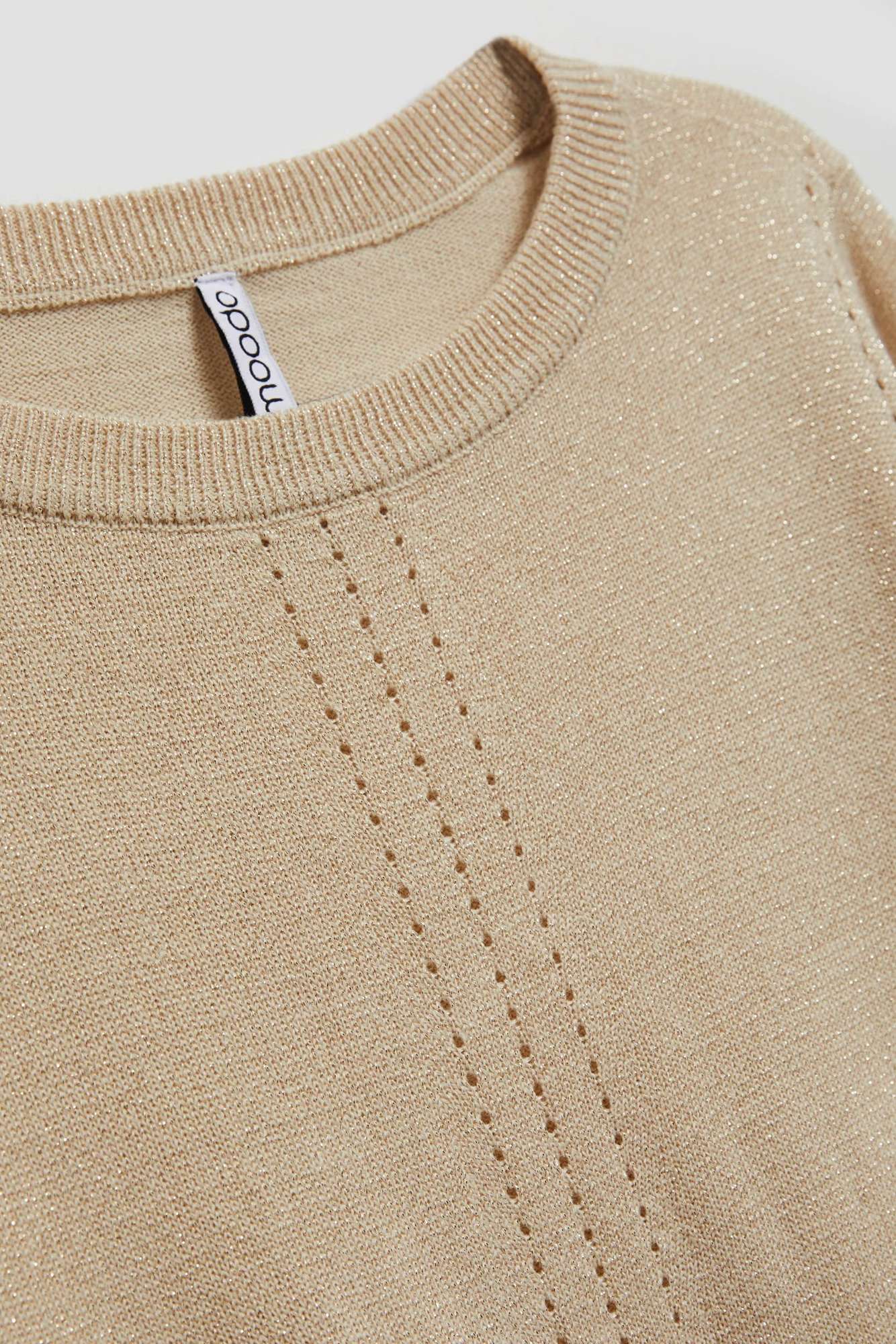 Sweater with openwork decoration