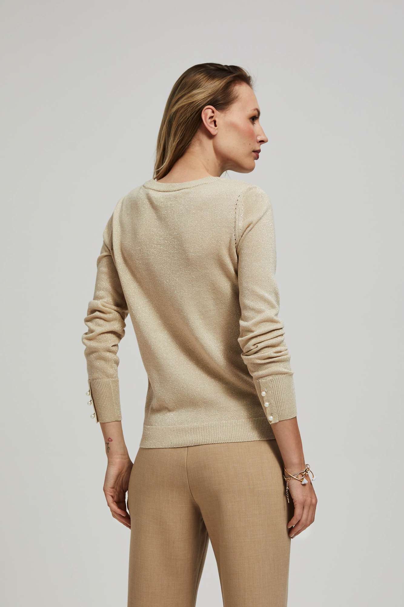 Sweater with openwork decoration