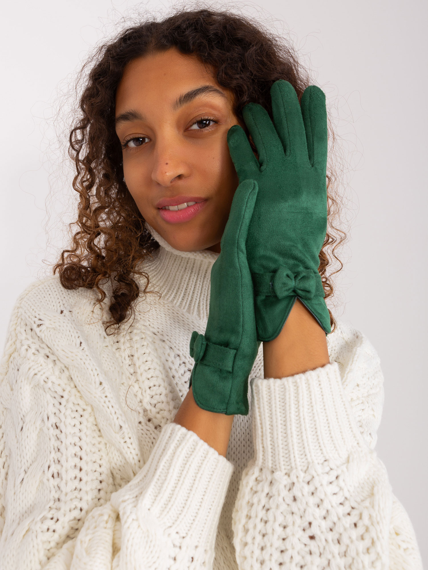 Levně Tmavě zelené elegantní rukavice s mašlí