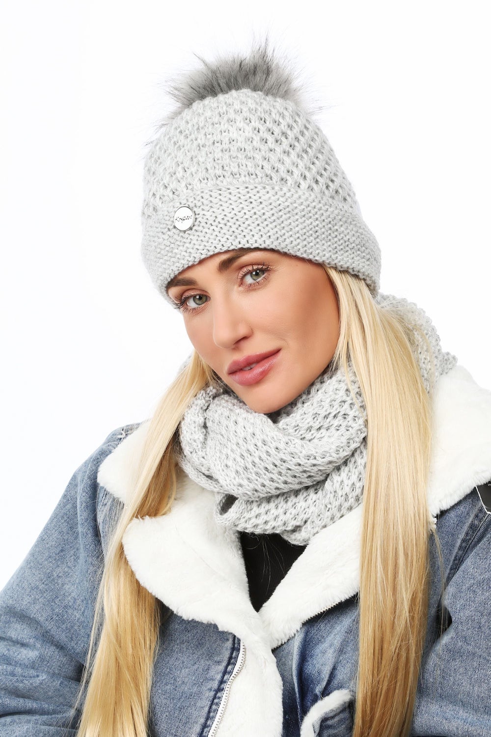 Winter women's set with openwork pattern in light gray