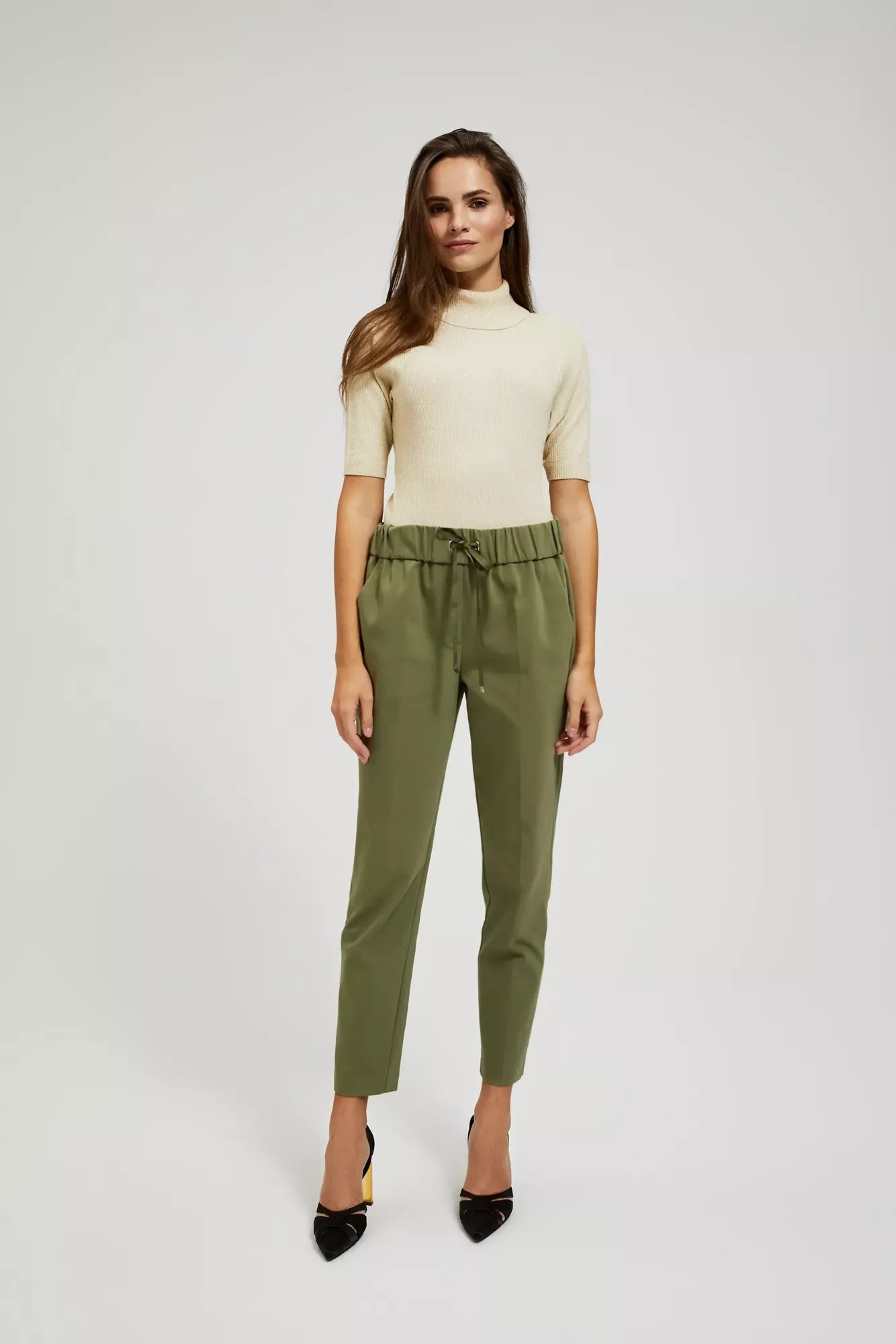 Turtleneck sweater decorated with metallic thread