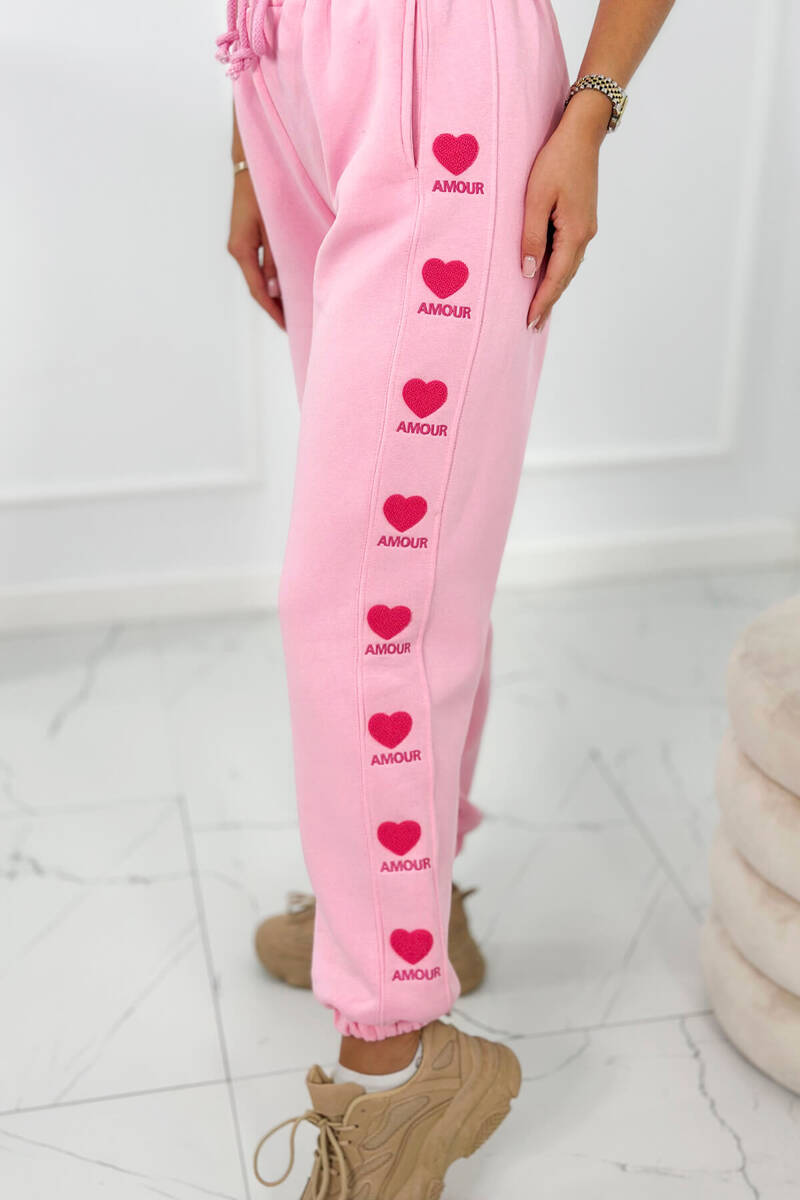 Levně Bavlněné kalhoty Amour růžové