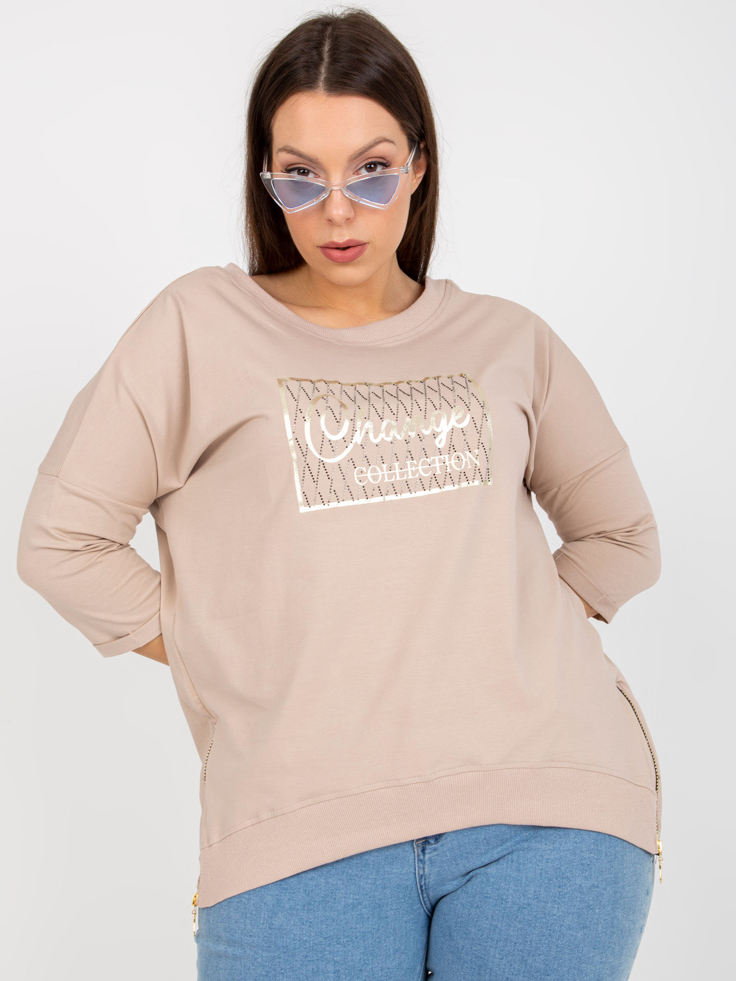 Beige blouse of larger size with rhinestone application