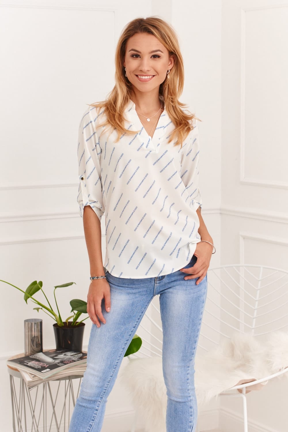 Airy shirt blouse with cream and blue patterns