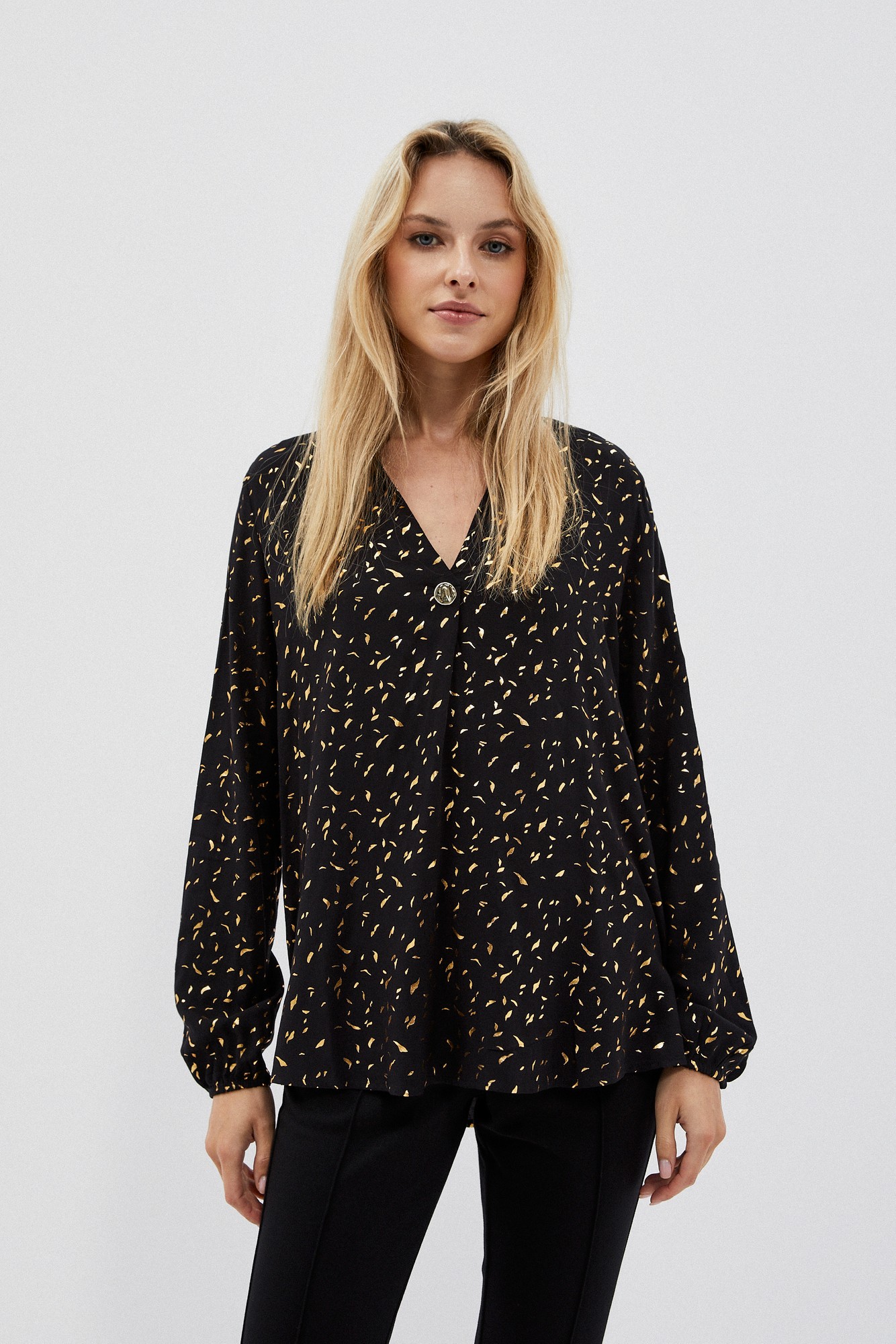 Shirt with print and decorative button