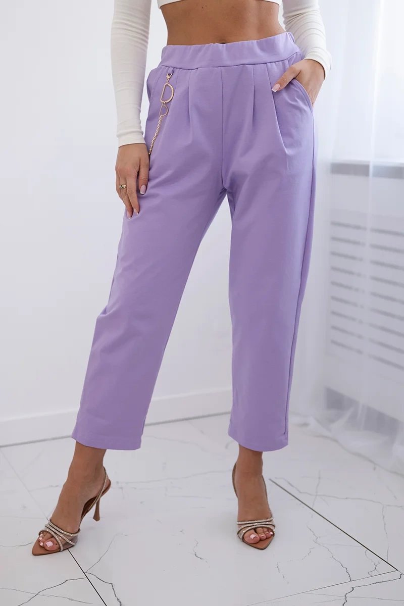New punto trousers with a light purple chain
