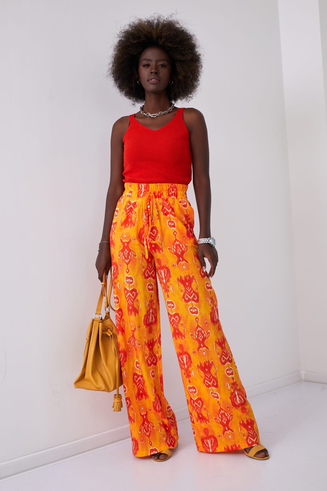 Wide women's trousers with orange patterns