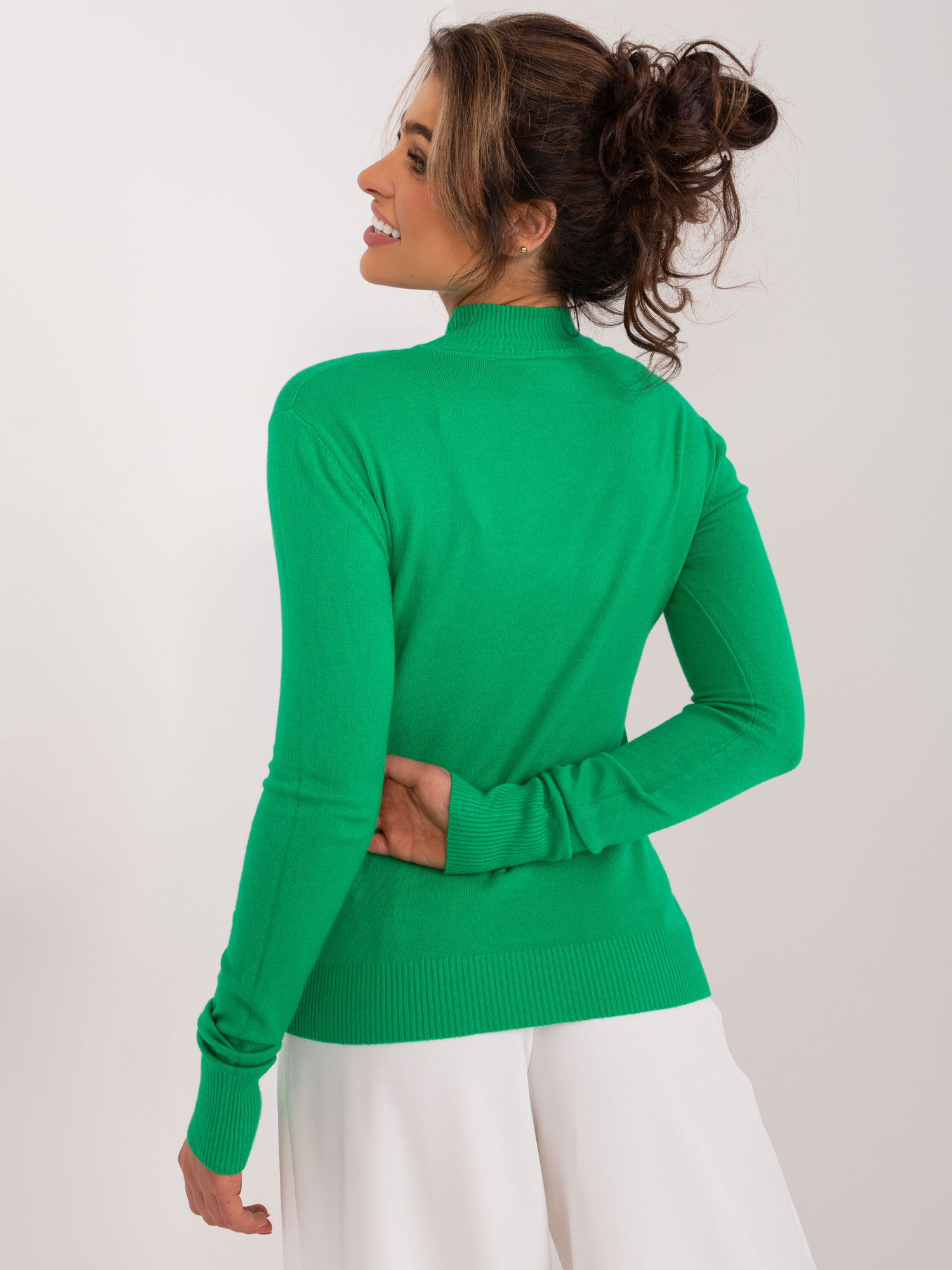 Green fitted turtleneck sweater