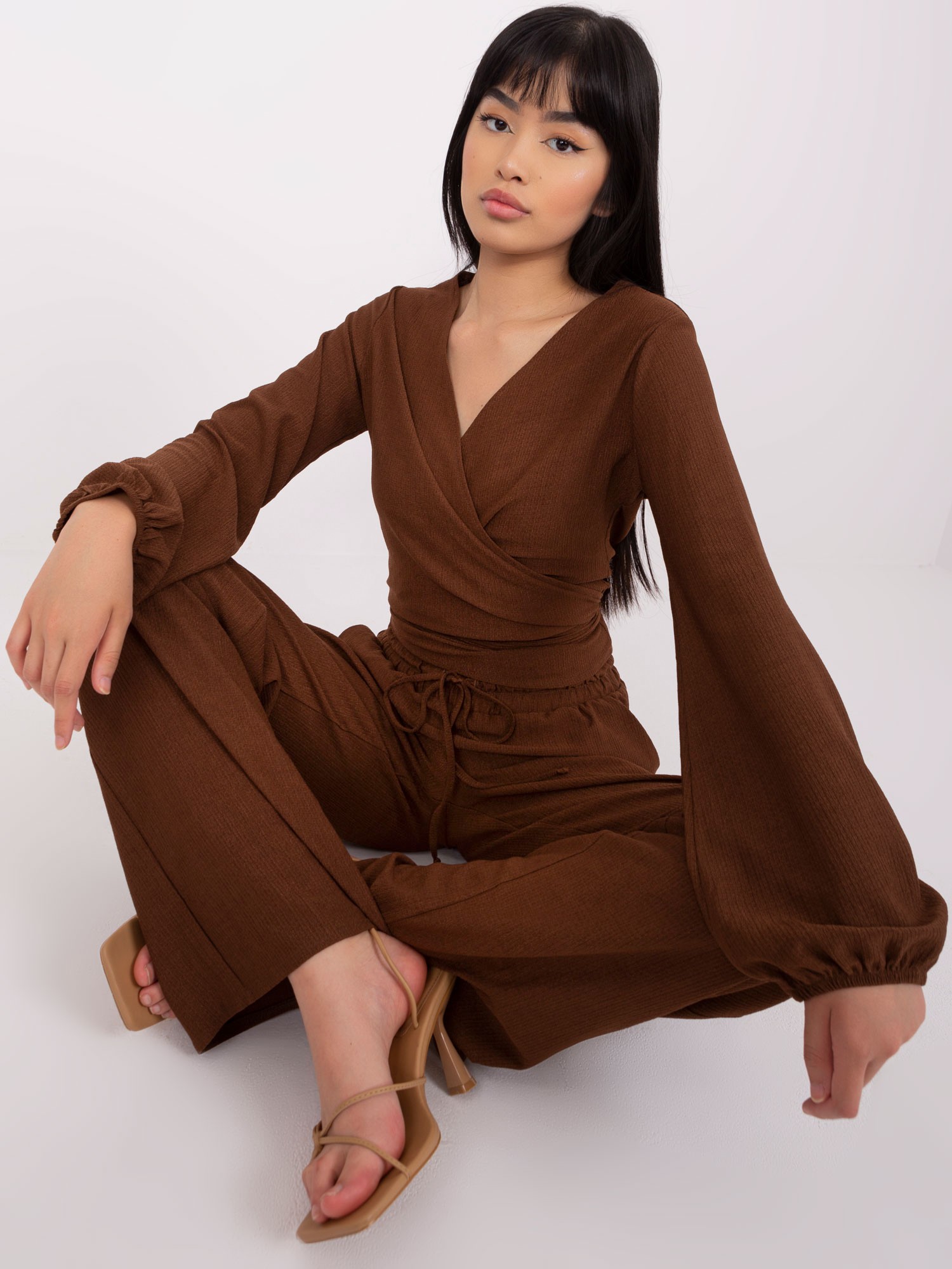 Brown women's casual ensemble with short blouse