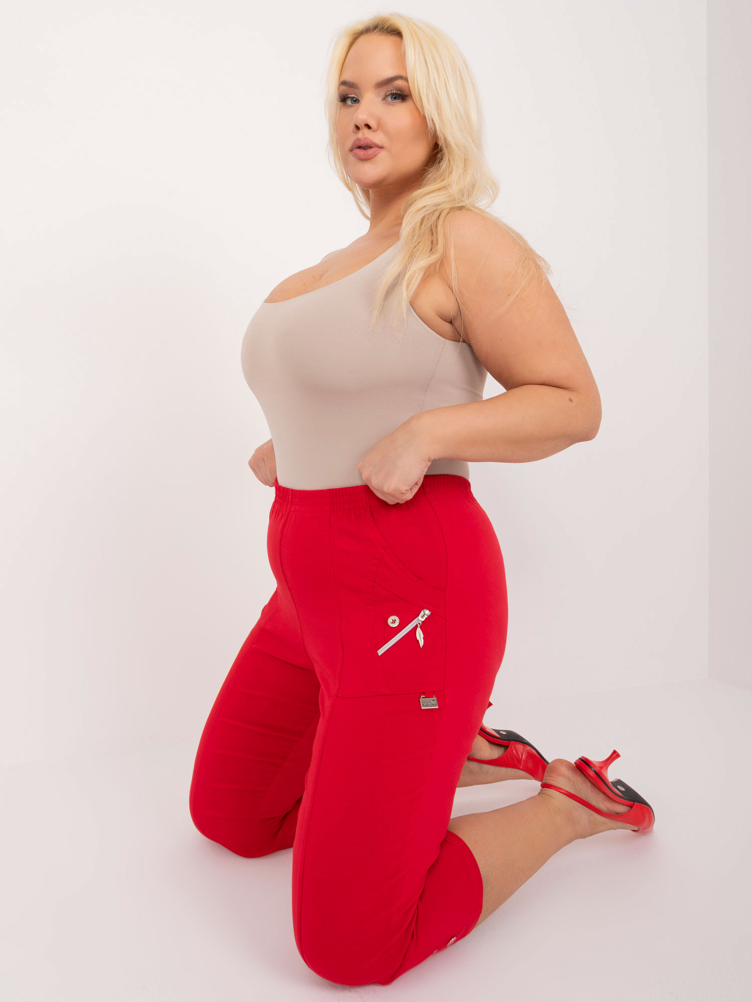Red fitted trousers in size 3/4 plus