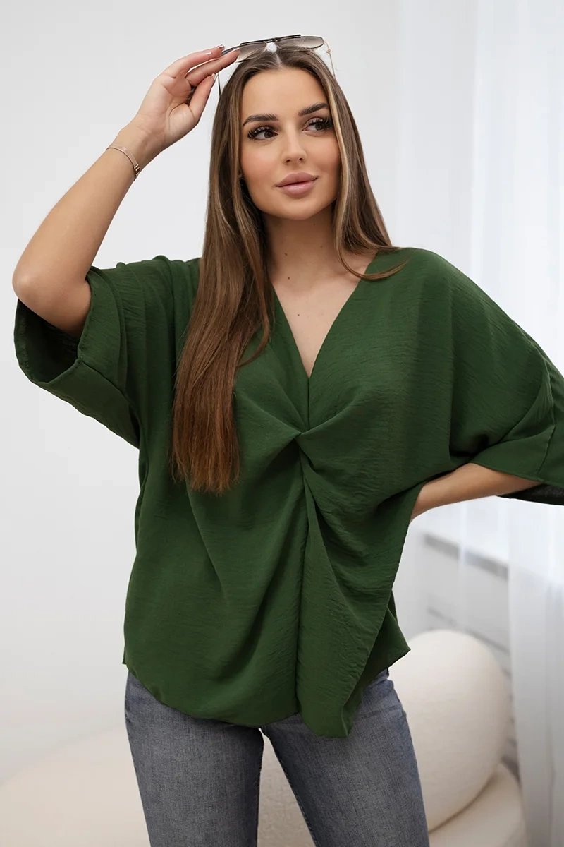 Oversized khaki blouse with a neckline