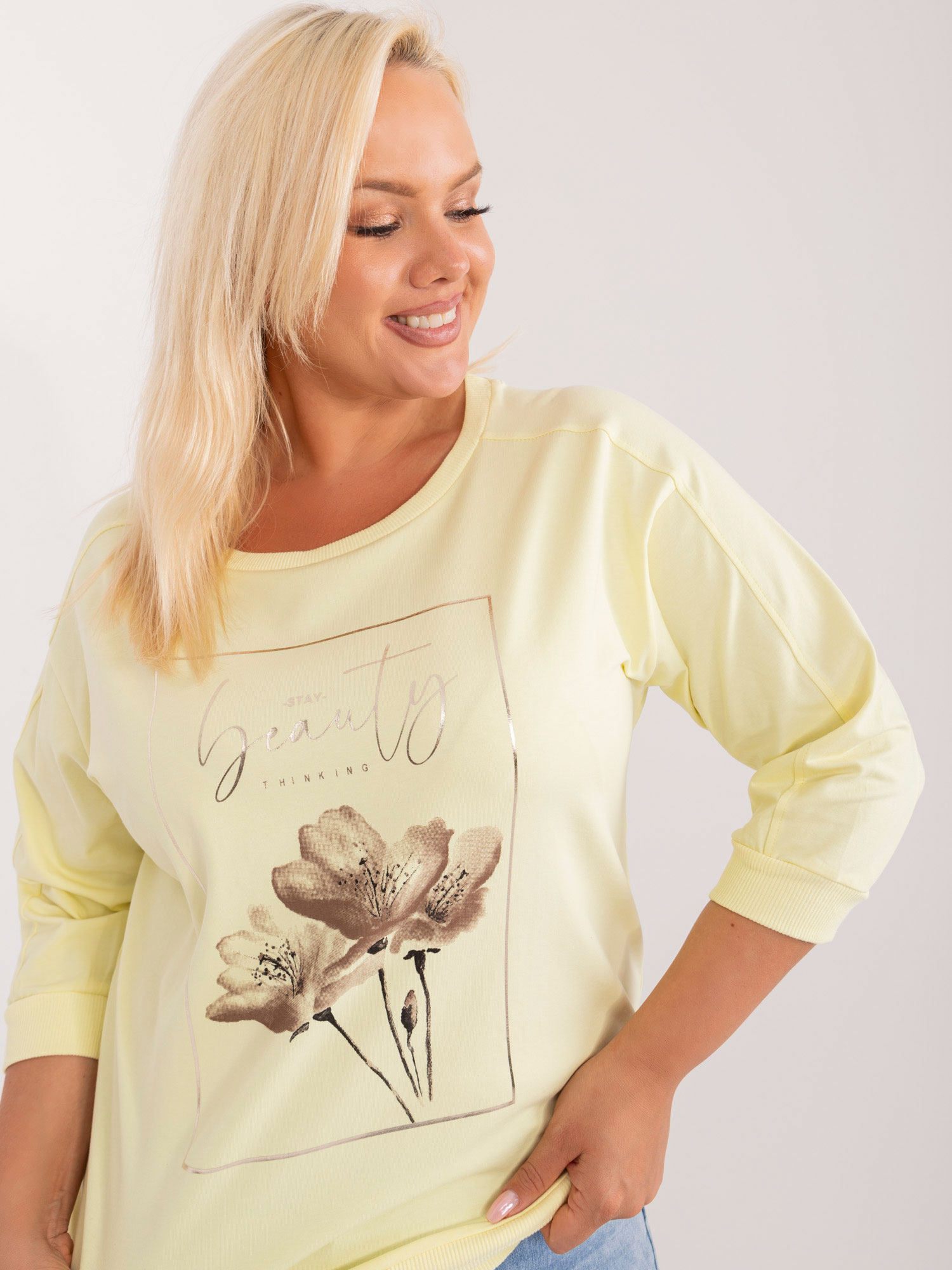 Light yellow plus size blouse with floral motif