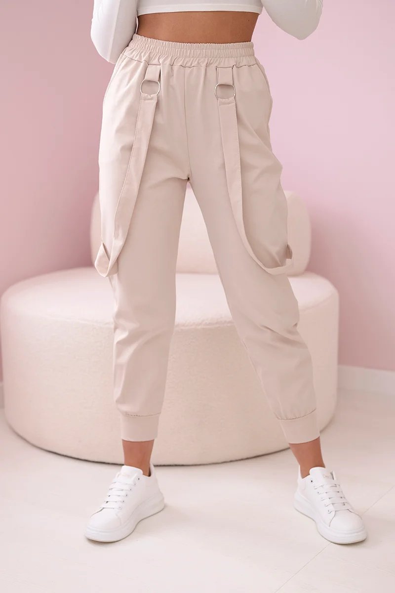 New punto trousers with beige decorative straps