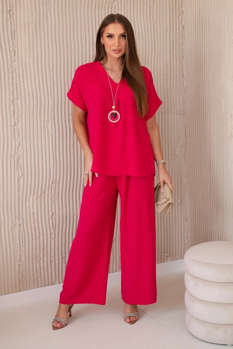 Set with necklace, blouse + fuchsia trousers