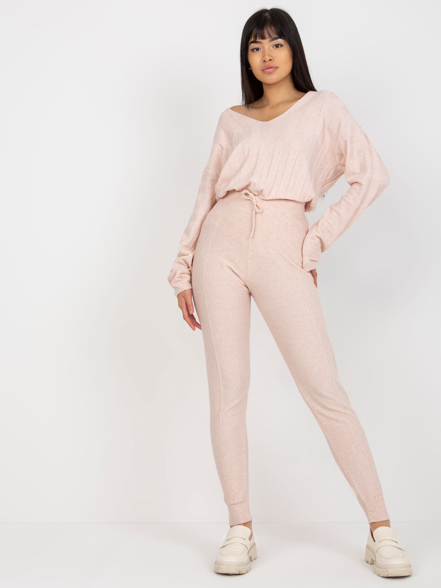 Light pink women's knitted trousers with tie