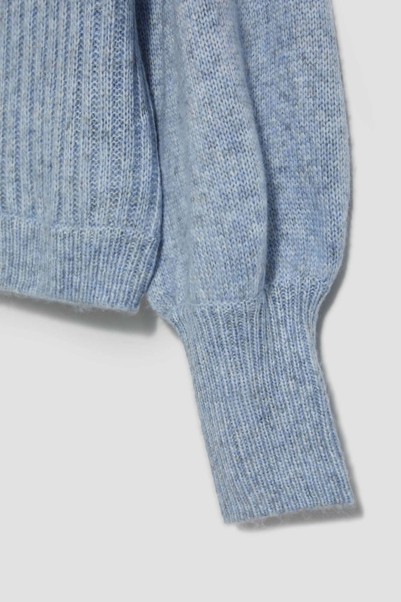 Sweater with fluffy sleeves