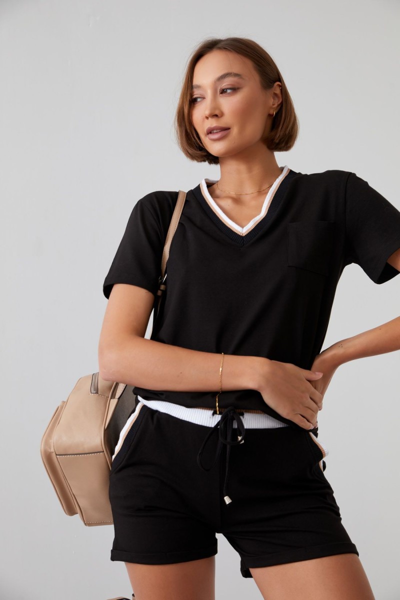 Women&#039;s summer ensemble with black shorts
