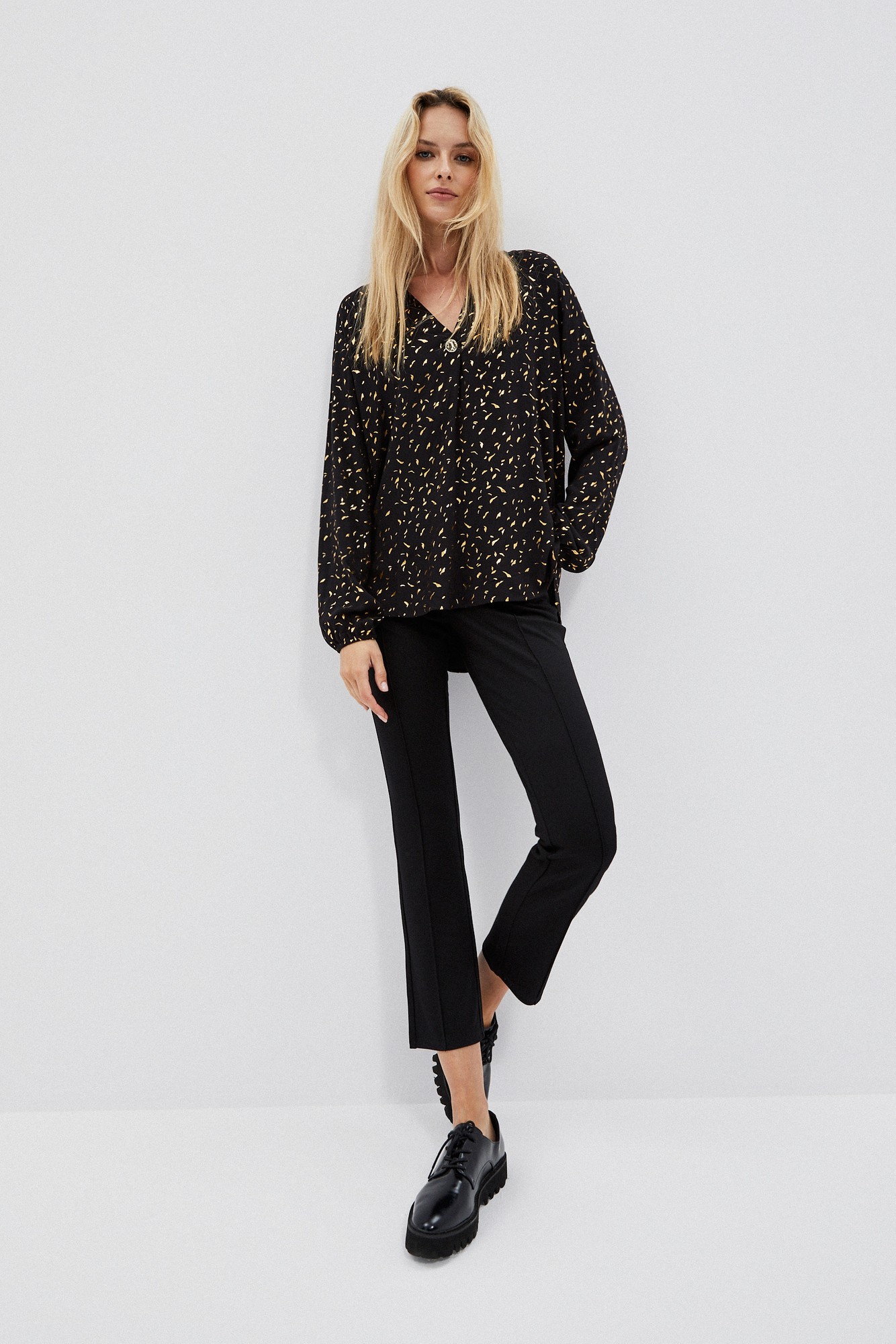 Shirt with print and decorative button