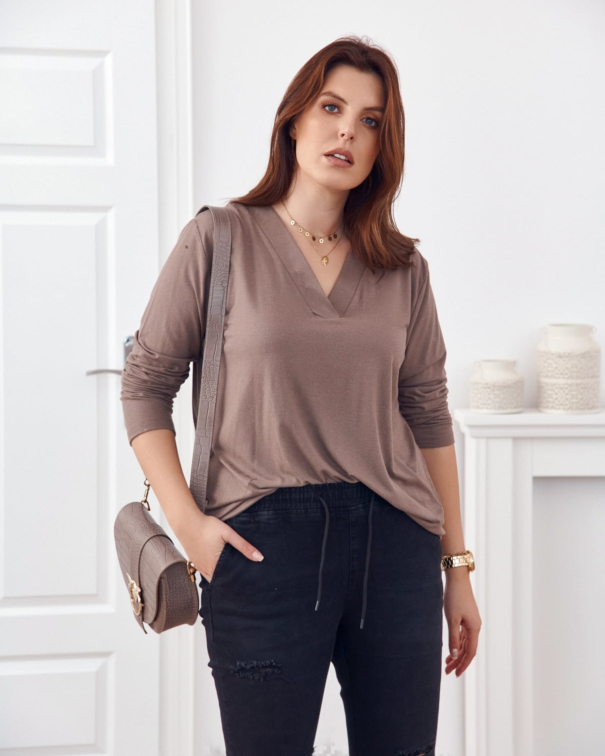Classic beige blouse with V-neck