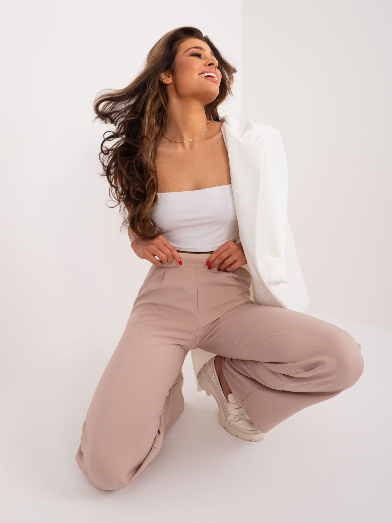 Beige trousers with high waist