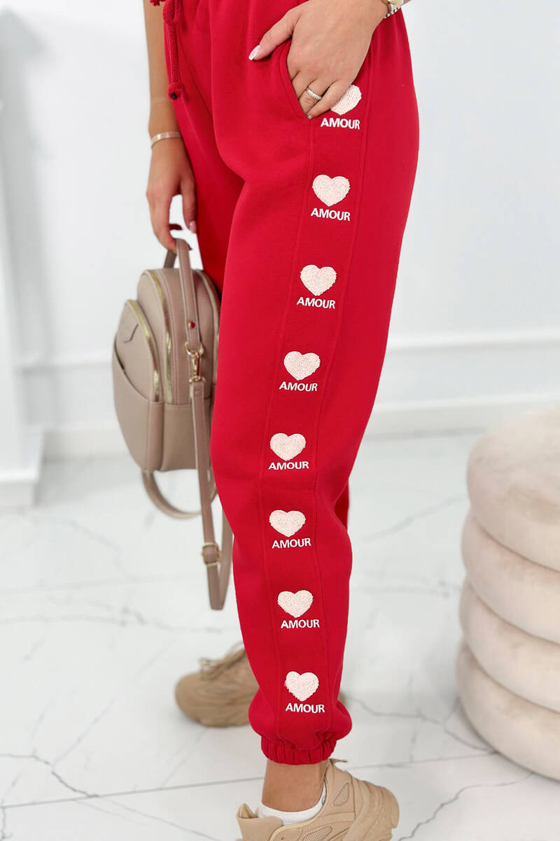 Levně Bavlněné kalhoty Amour červené