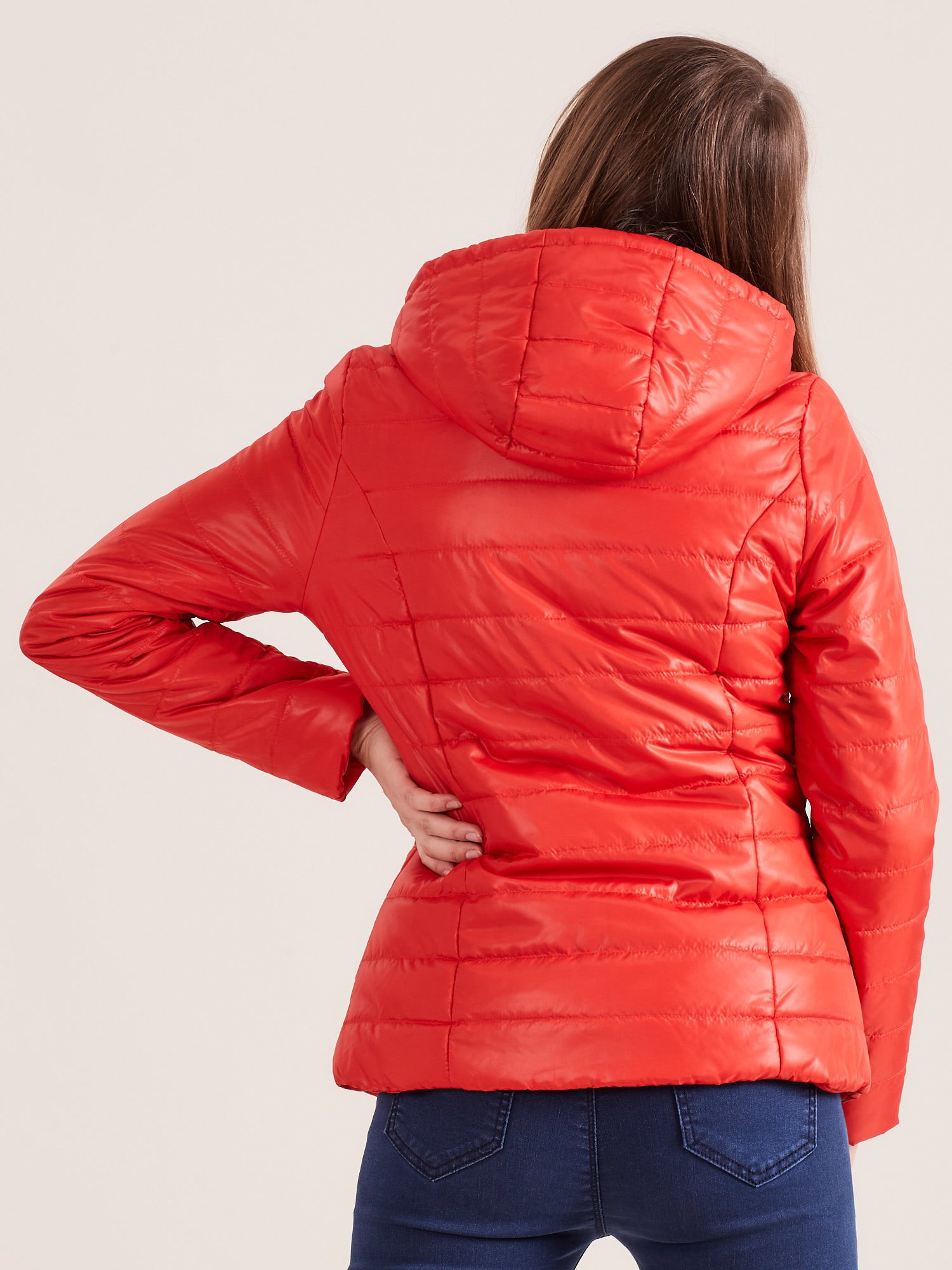 Orange quilted jacket with hood