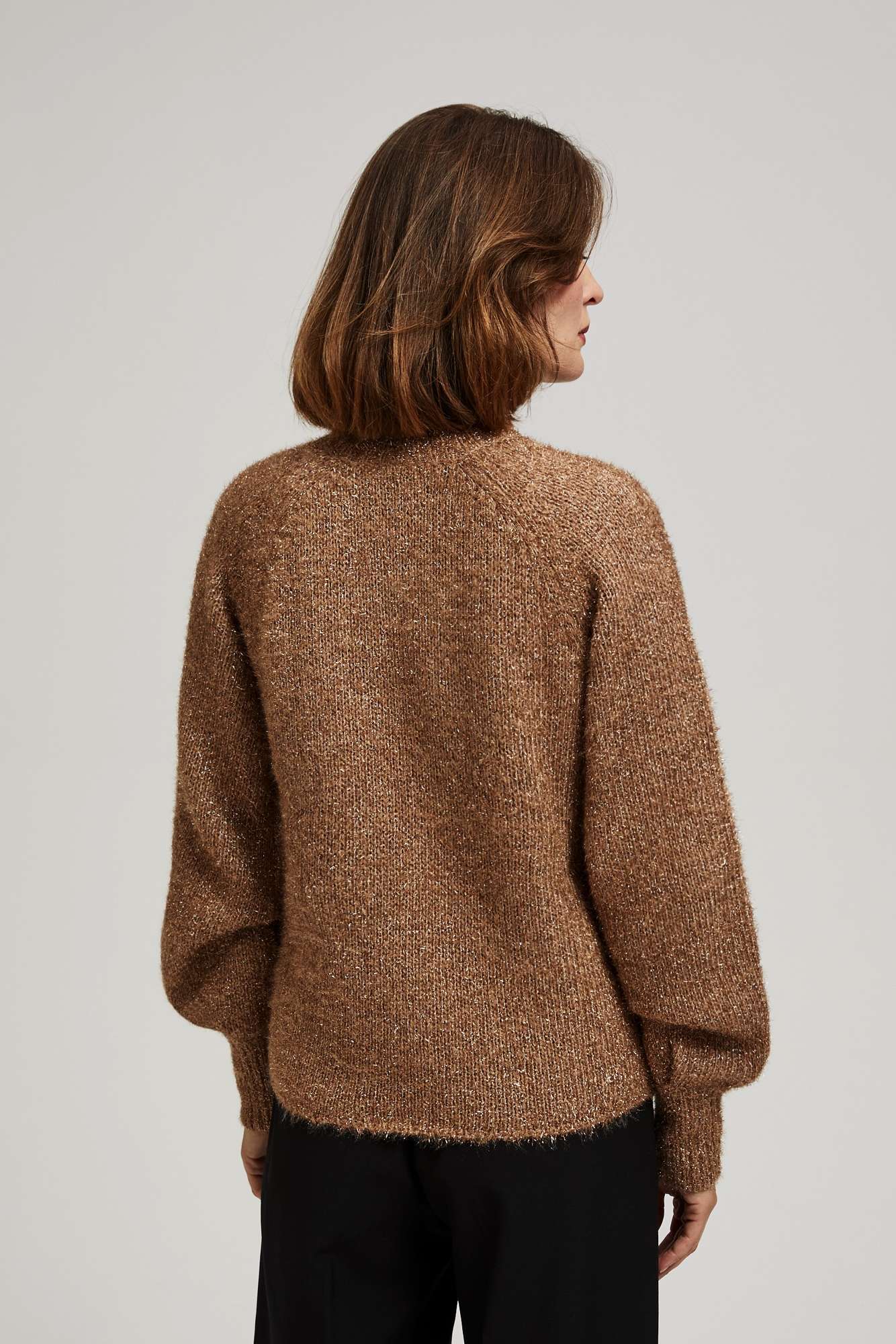 Turtleneck sweater decorated with metallic thread