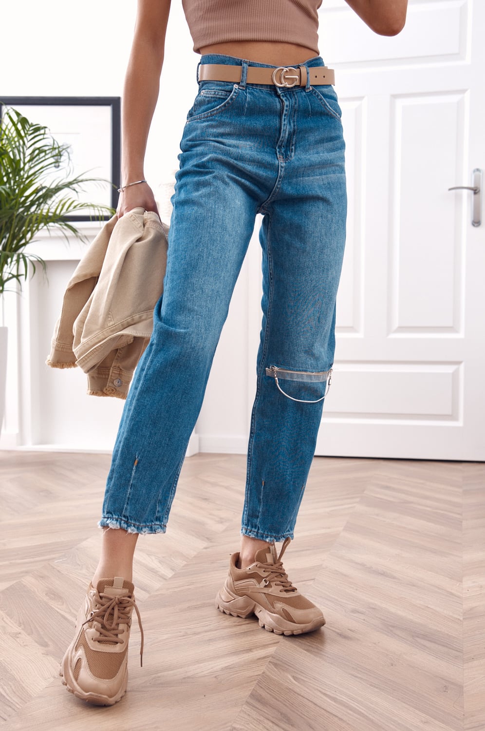 Tight high-waisted denim trousers