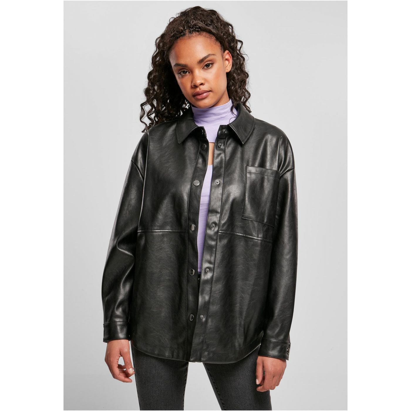 Women&#039;s shirt made of black synthetic leather