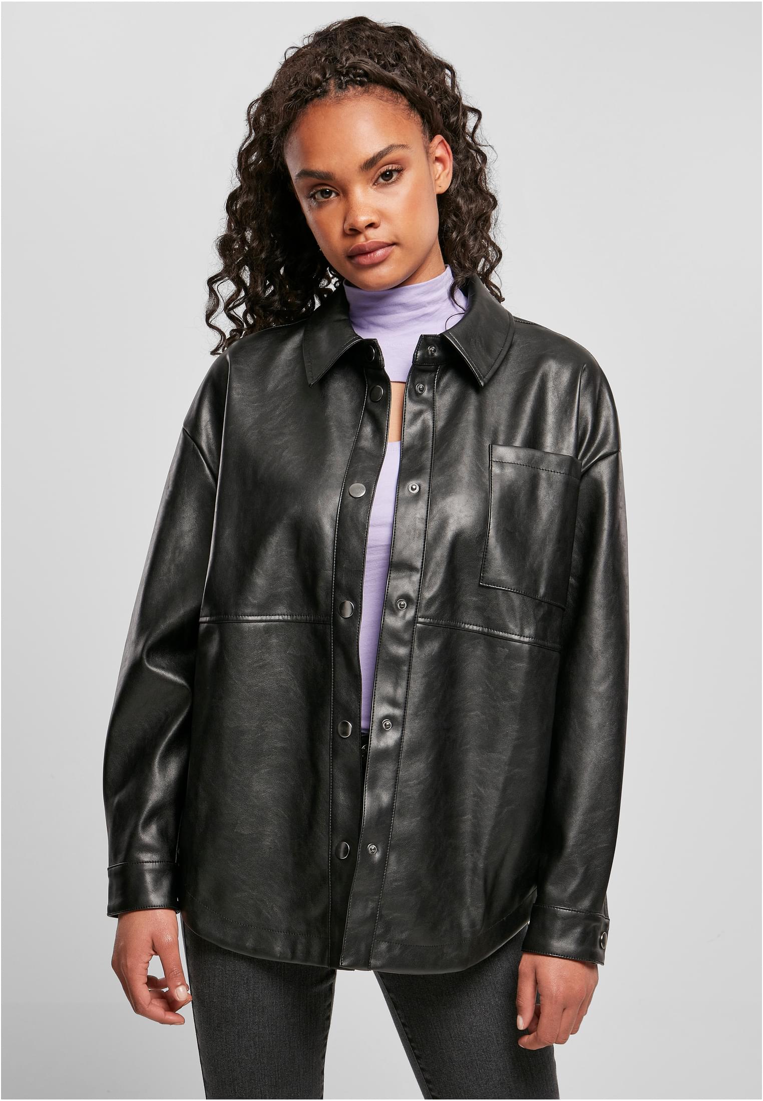 Women's shirt made of black synthetic leather
