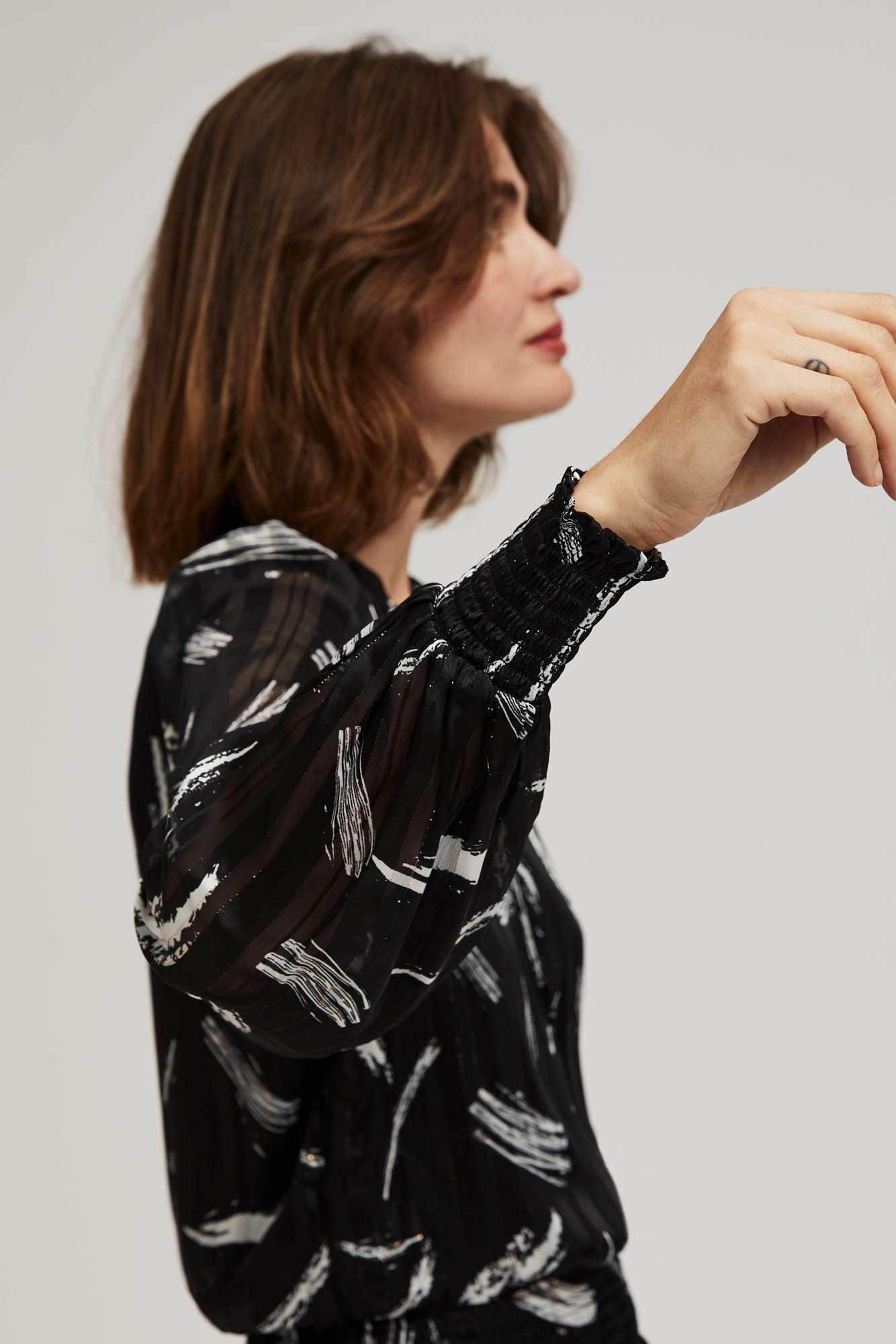 Shirt with a tied neckline